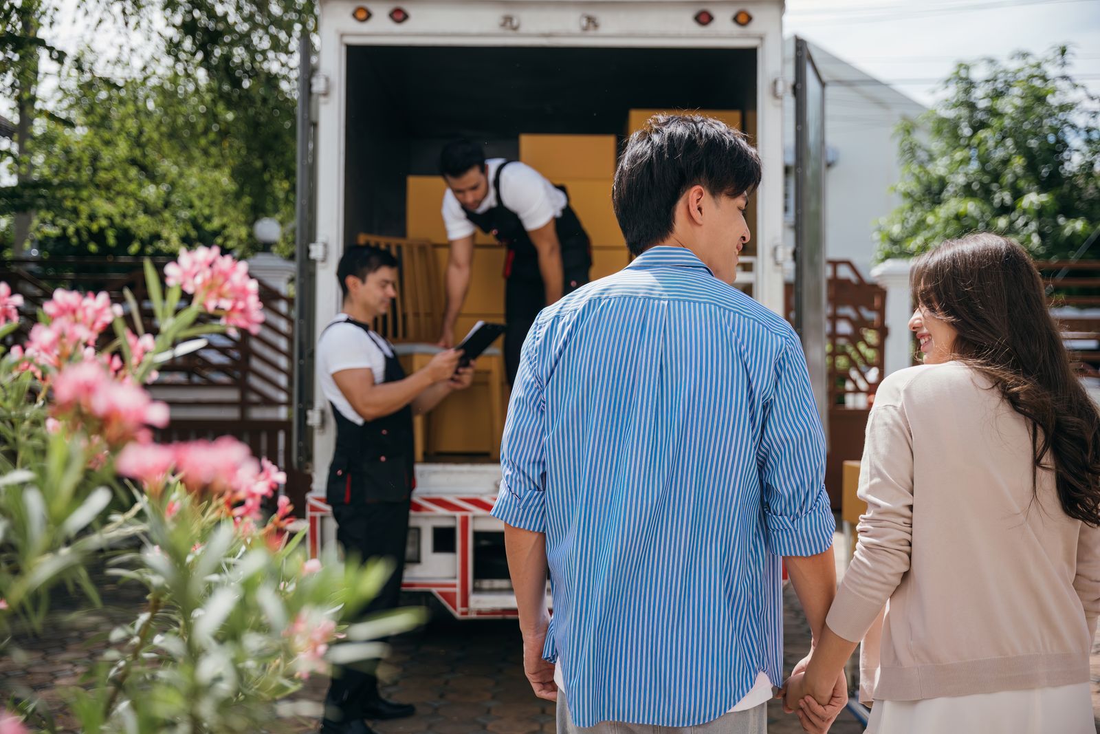 A family moving into a house