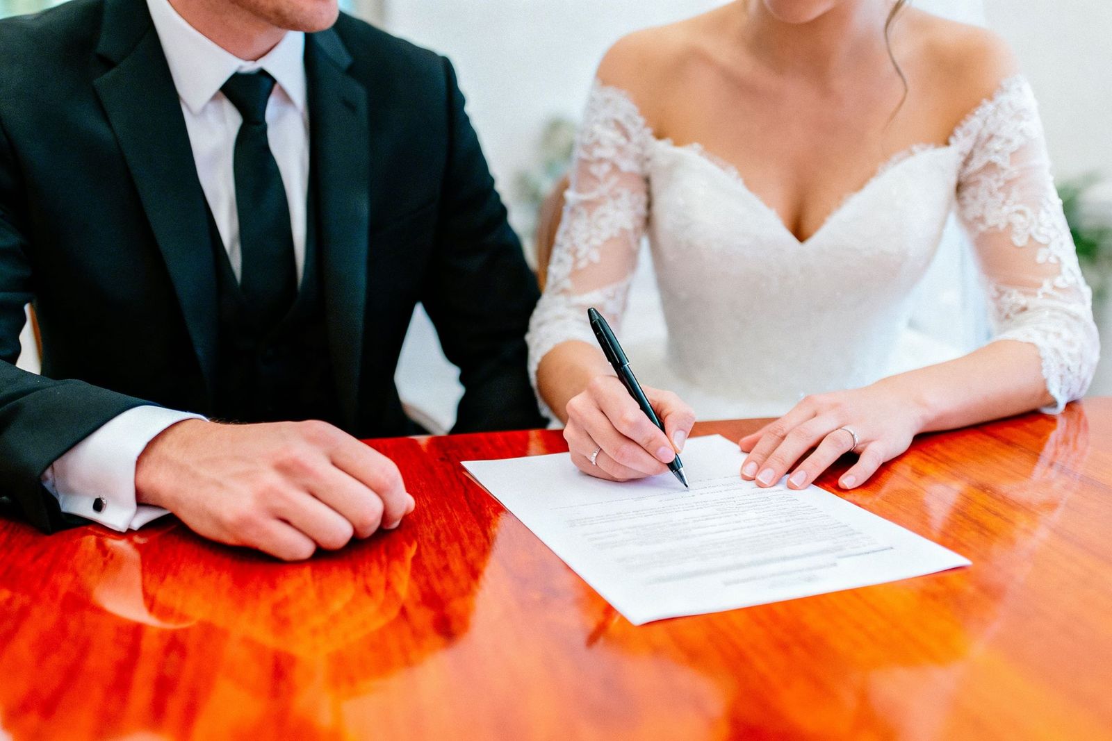 A couple signing a document
