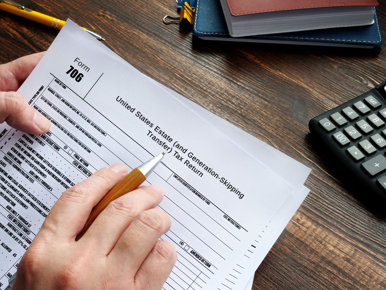 Form 706 with a pen